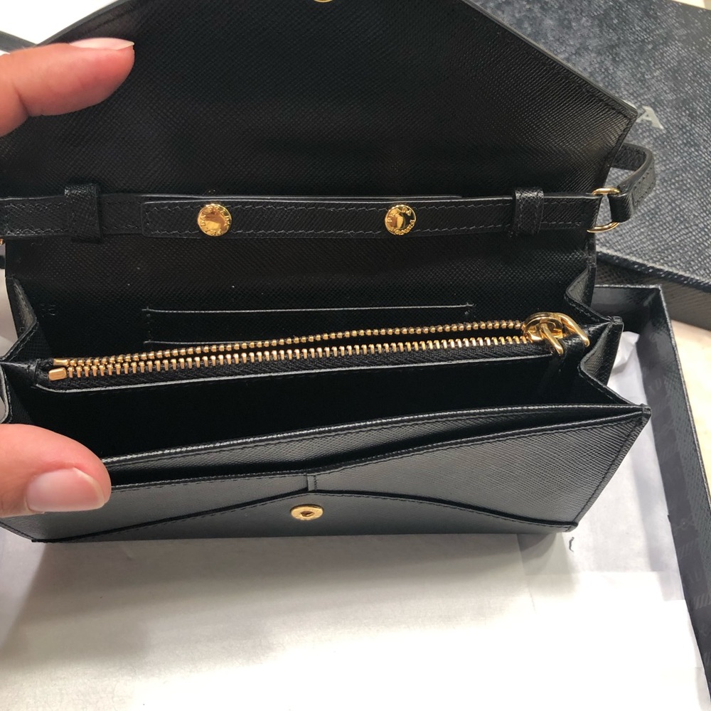 100 % Authentic Prada Wallet crossbody, 
Black.